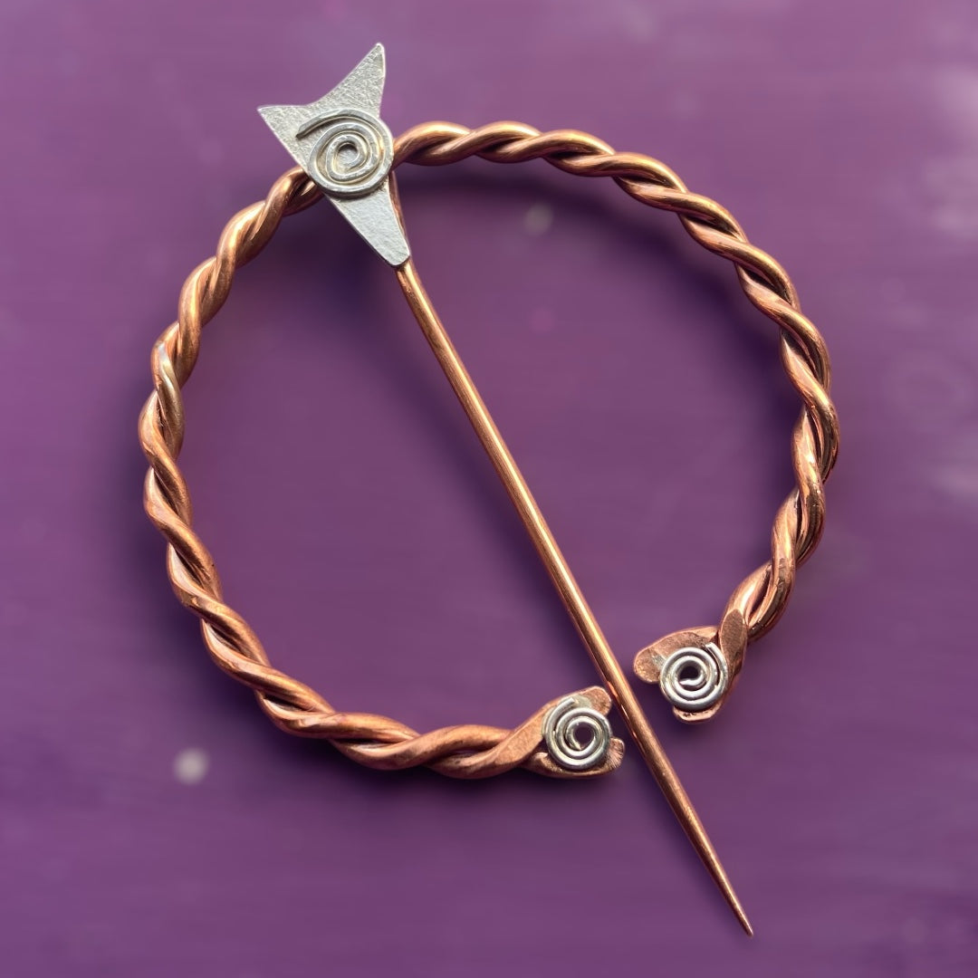 Celtic pennanular copper and sterling silver brooch